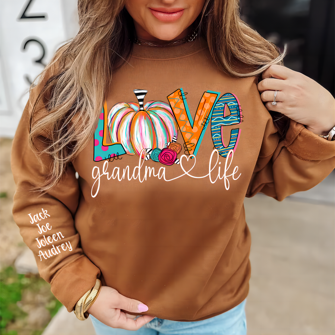 Personalized Love Grandma Life Sweatshirt – Fall Pumpkin Design with Grandkids’ Names on Sleeve
